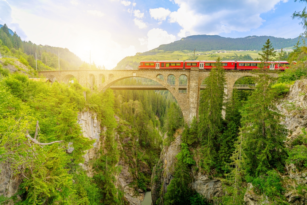 Red,Train,Crossing,The,Solis,Viaduct,Bridge,Of,Swiss,Railway